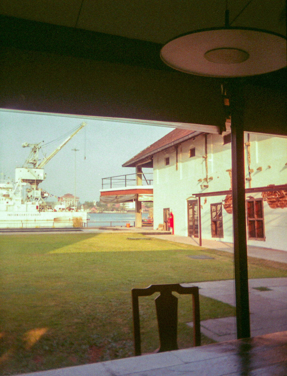 Dockside view through a heritage doorway frame