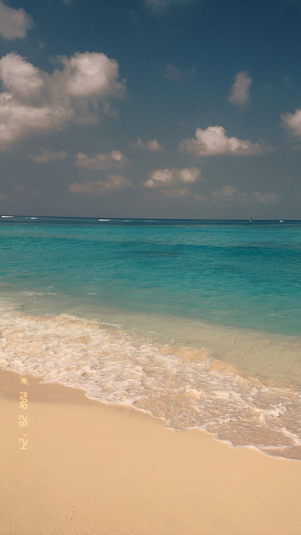 Lakshadweep — surf breaking on the shore