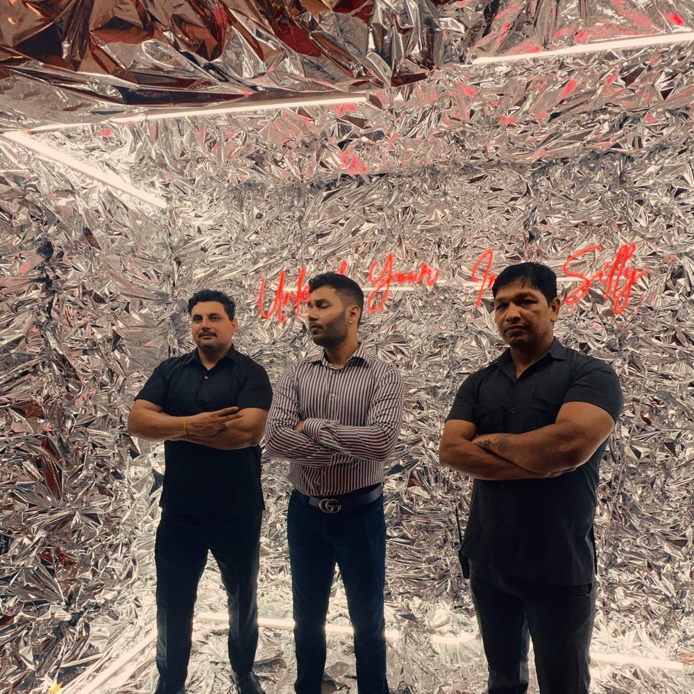 Ninety-Eight — the four of us on set