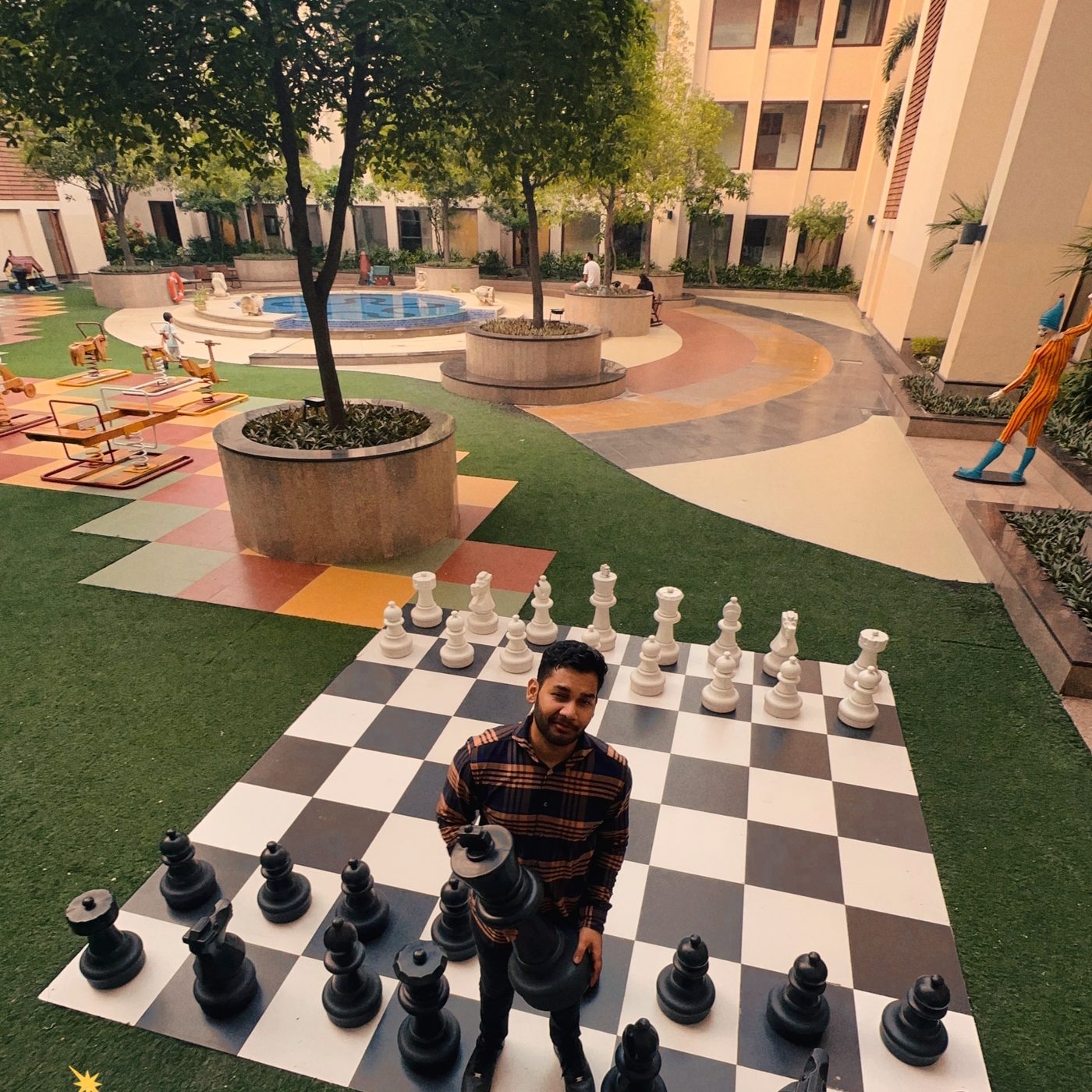 Standing on a giant outdoor chessboard