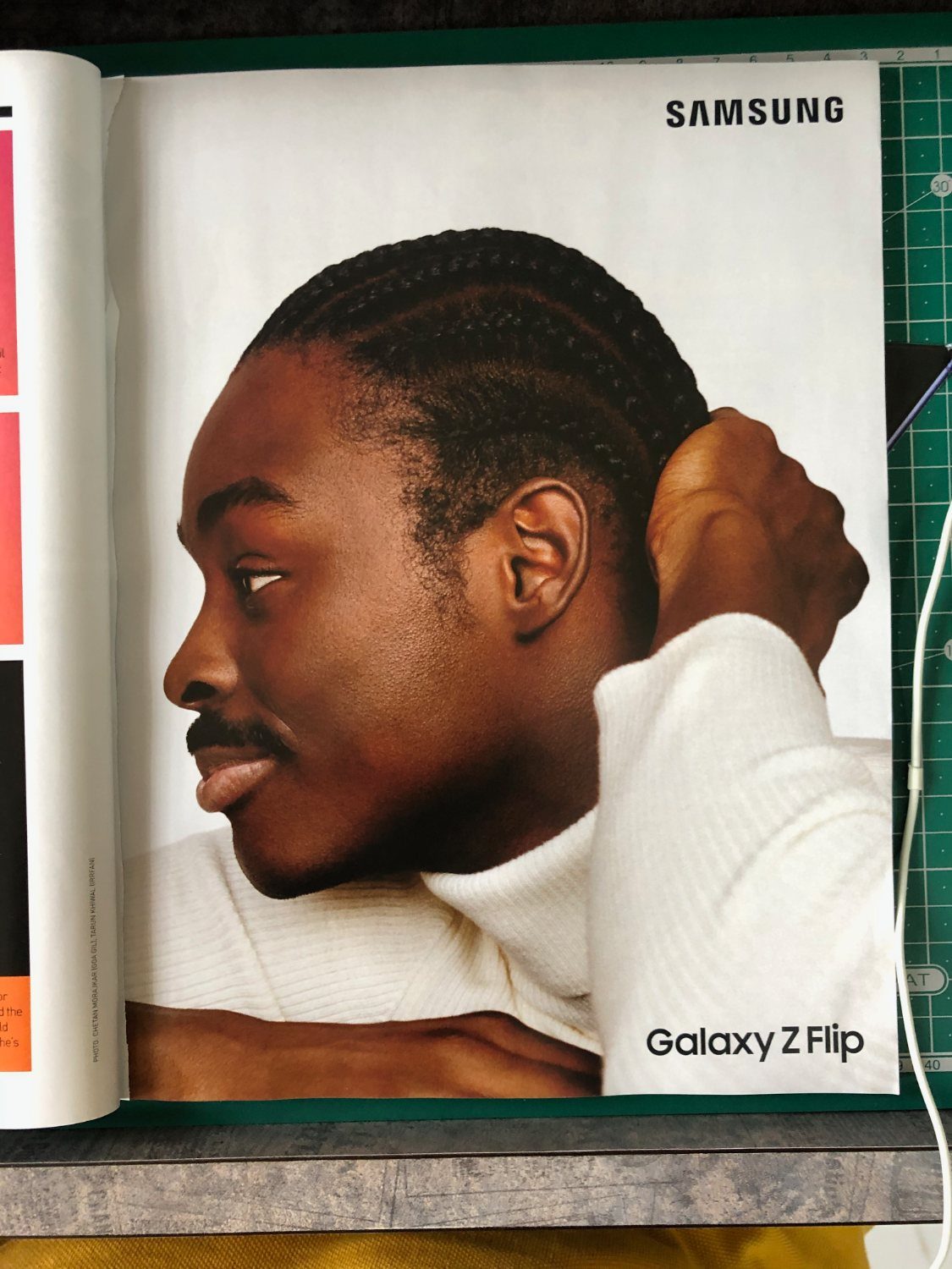 Samsung Galaxy Z Flip magazine advertisement: a side profile of a man with cornrows in a white turtleneck